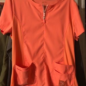 Koi lite large scrub top worn once and washed. Too big ordered smaller size